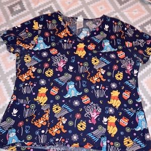 Winnie the Pooh scrub top with flowers and honey pots. Super cute dk blue.